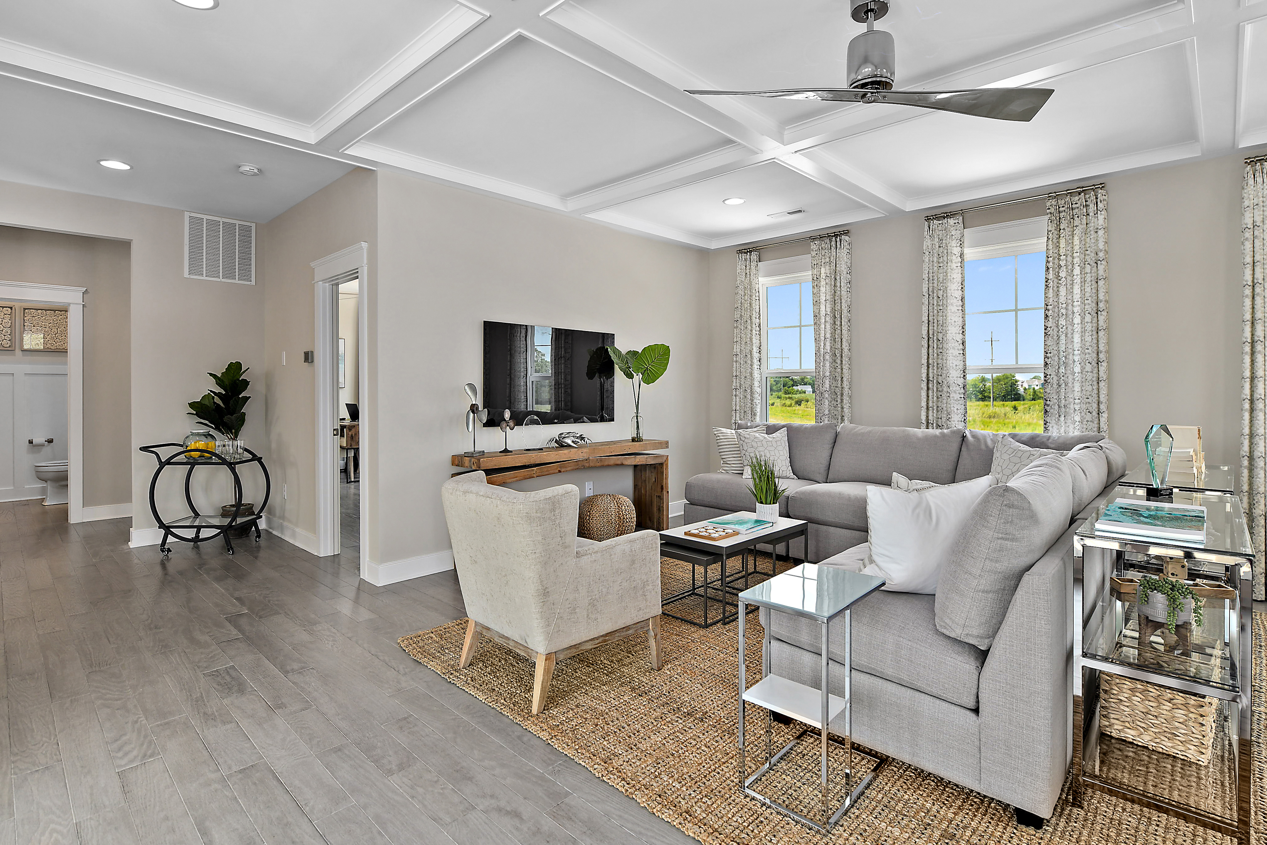 Great Room with Large Sectional and Coffered Ceiling