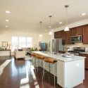 Open floorplan kitchen and living room area in Preston Lake townhome
