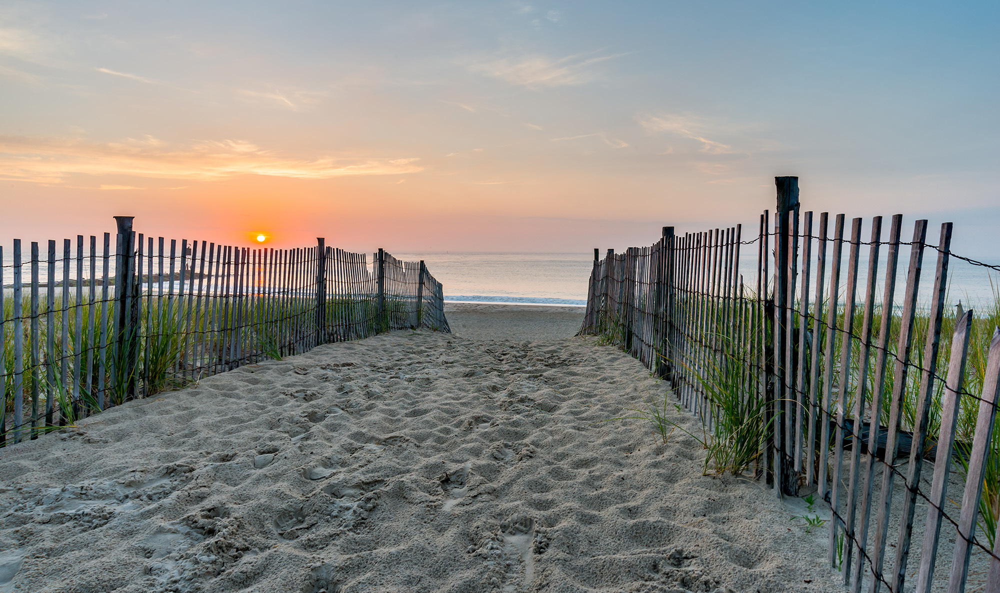 Image of beach walkway leading to the ocean in Delaware