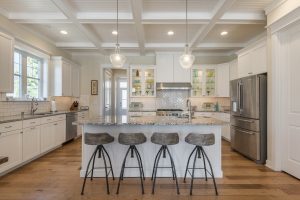 Large gourmet kitchen in custom beach home by Evergreene Homes in Bethany Beach