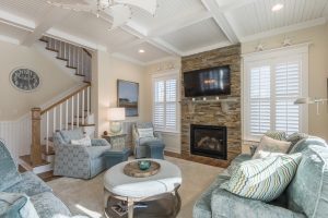 Sunny living room in new construction beach home by Evergreene Homes