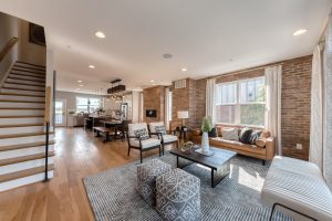 Open floorplan including living room, kitchen and dining room in Baltimore luxury townhome 