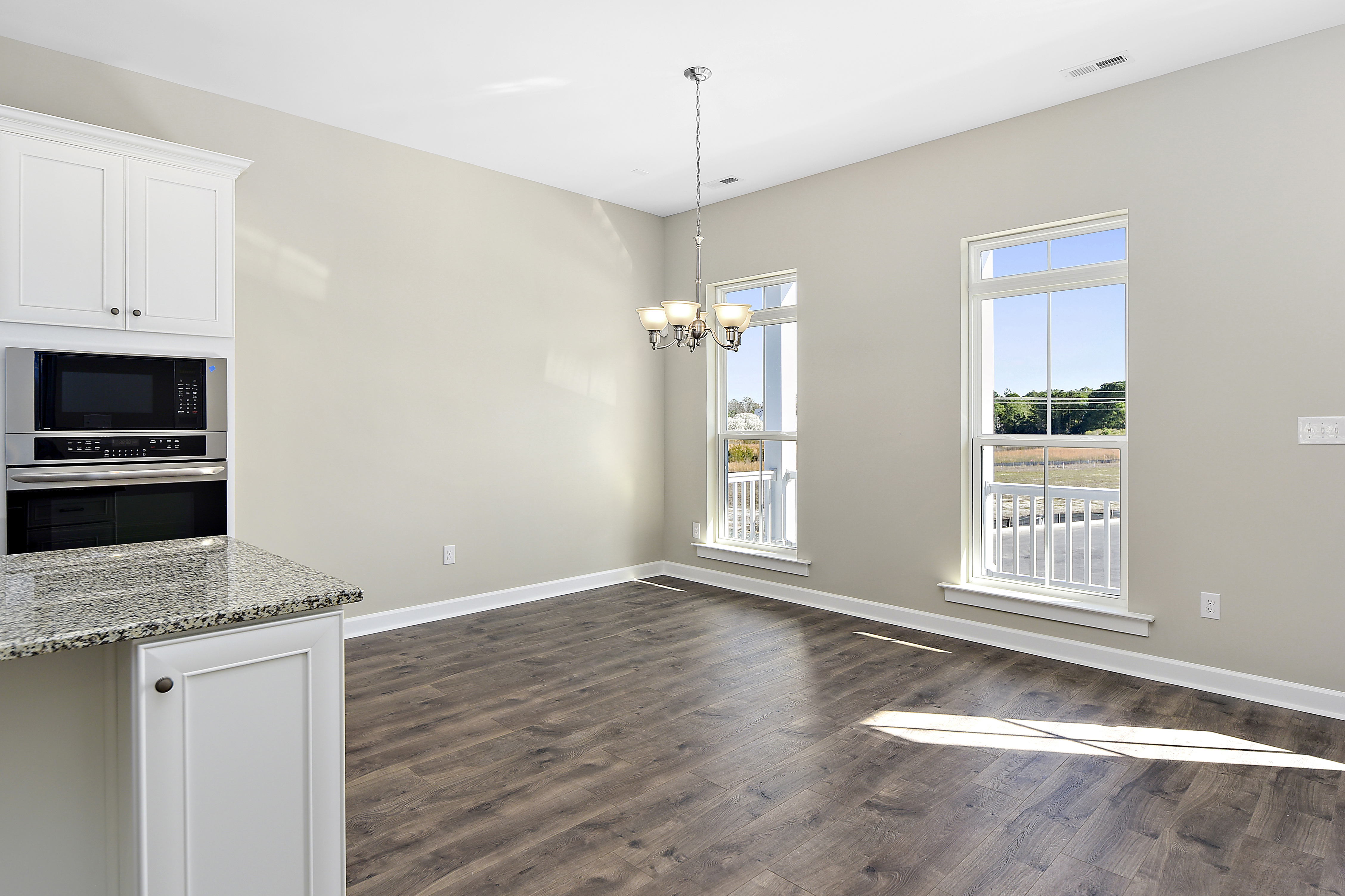 Open floorplan layout showing the living room and part of the kitchen in Delaware home