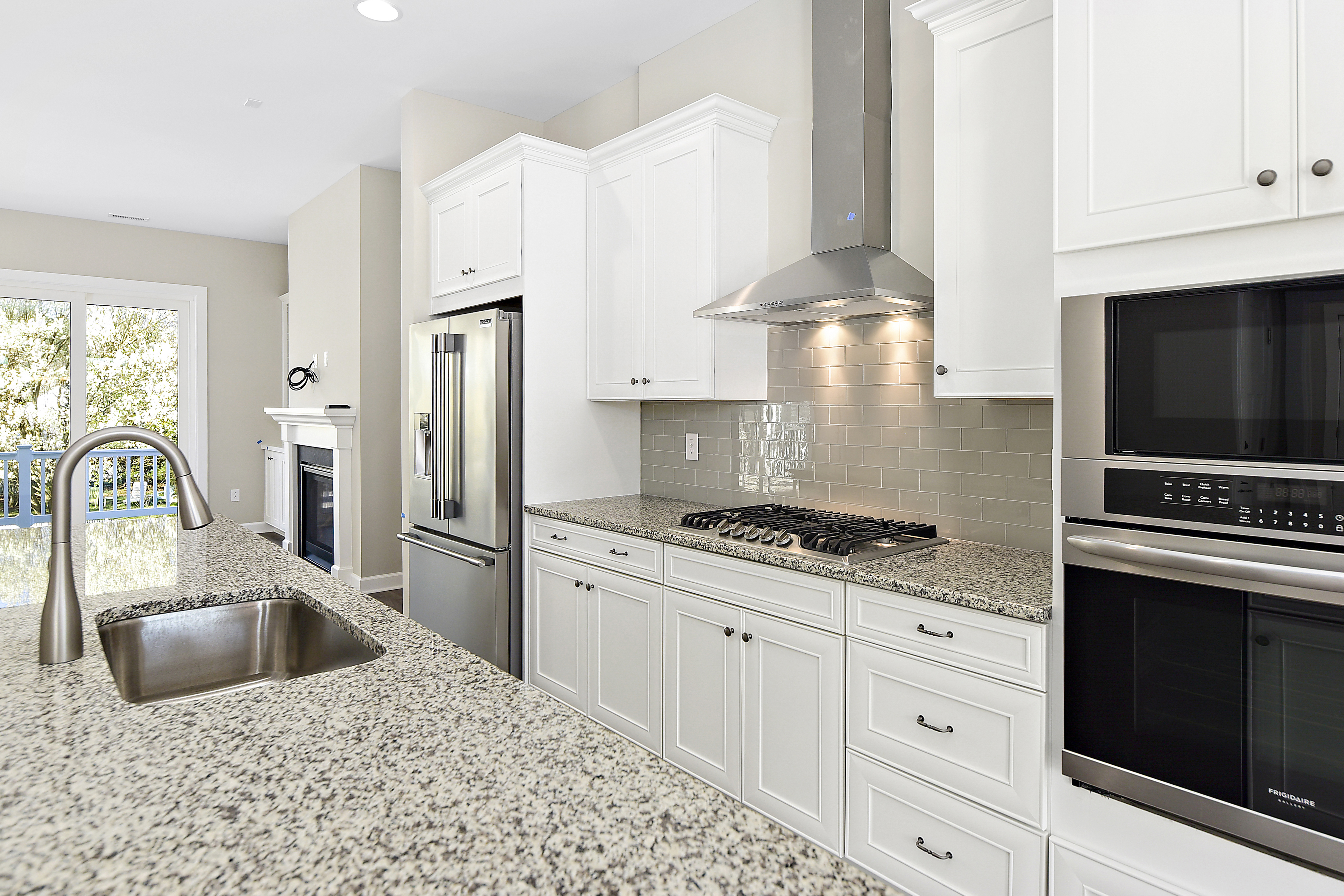 Spacious granite countertops and stainless steel appliances