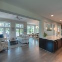 Living room and kitchen area in the Banyan II floorplan by Evergreene Homes