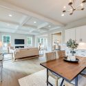 Addison II open floorplan living room and dining room with coffered ceilings
