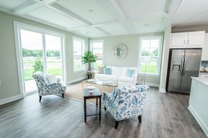 Luxury townhome living room with coffered ceilings on the Eastern Shore of Delaware