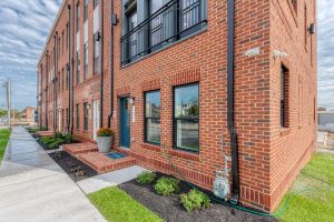 Brick facade near front door at Brewer's Crossing in Brewer's Hill