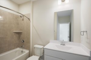Modern bathroom with sleek design in the Linwood floor plan.
