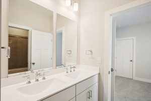 Modern bathroom with sleek fixtures in the Linwood floor plan.