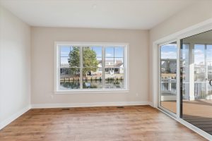 Elegant dining room with modern table in the Shearwater floor plan.