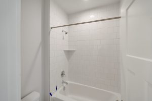 Exterior view of the Magnolia floor plan home with landscaped yard.