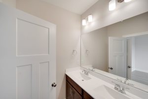 Exterior front view of the Magnolia floor plan home with modern architecture.