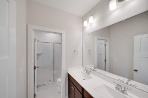 Modern bathroom with sleek fixtures in the Magnolia floor plan.