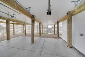 Spacious primary bedroom with modern decor in the Magnolia floor plan.