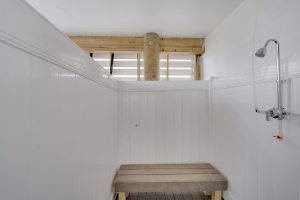 Cozy primary bedroom with modern furnishings in the Magnolia floor plan.