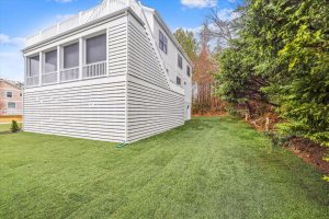 Rear exterior of Campbell floor plan with windows.