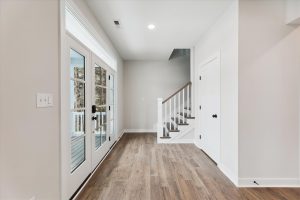 Foyer in Campbell floor plan with elegant decor.
