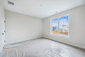 Modern primary bedroom in the Campbell floor plan home