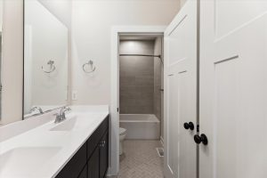Modern vanity area in the Campbell floor plan home