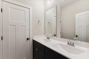 Modern vanity area in the Campbell floor plan home