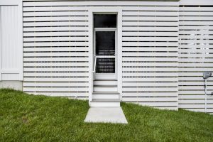 Exterior side view of the Brackish Dr. home with modern design.