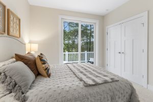 Open-concept kitchen and living area in the Brackish Dr. home.