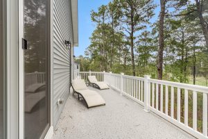 Living area with contemporary furniture in the Brackish Dr. home.