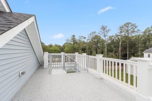 Secondary bedroom with neutral decor in the Brackish Dr. home.