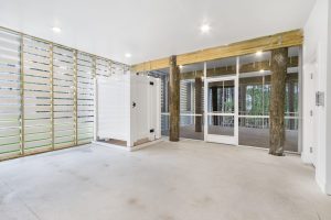 Outdoor patio with modern seating in the Brackish Dr. home.
