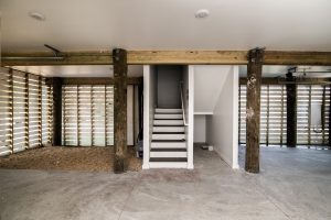 Coastal-style living area in the Blue Fin floor plan home