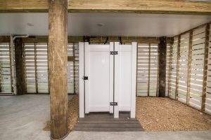 Living room in Blue Fin at Bethany Beach with decor.