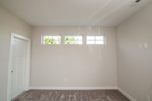 Coastal-style exterior of the Blue Fin floor plan home