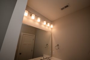 Coastal-style kitchen in the Blue Fin floor plan home