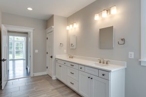Modern bedroom in the Aquinnah floor plan home