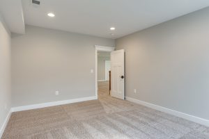 Cozy bedroom in the Aquinnah floor plan home