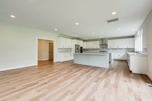 Dining area in Cambridge-II floor plan with decor.