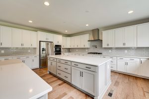 Bedroom in Cambridge-II floor plan with decor.