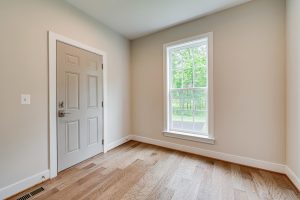 Coastal-style living area in the Cambridge II floor plan home