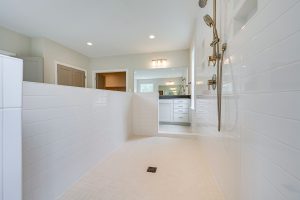 Living room in Cambridge-II floor plan with decor.