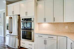 Dining area in Hillsboro floor plan with decor.