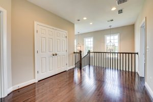 Living room in Hillsboro floor plan with decor.
