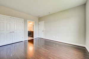 Kitchen in Hillsboro floor plan with sleek cabinets.