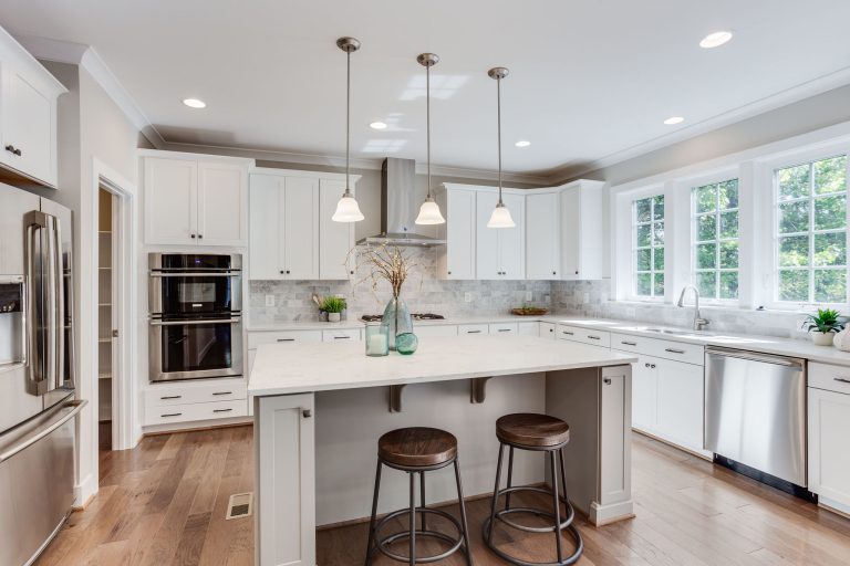 Living room in Keene Mill floor plan with decor.