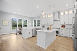 Living room in Dickens-II floor plan with windows.