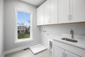 Bedroom in Dickens-II floor plan with modern decor.
