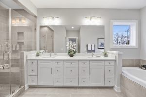 Living room in Dickens-II floor plan with decor.