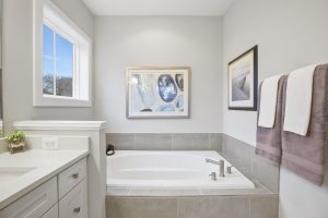 Modern bedroom in the Dickens II floor plan home