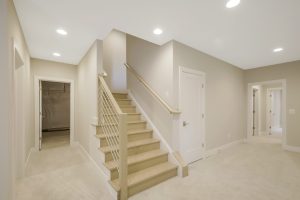 Living room in Foxmoor floor plan with modern decor.