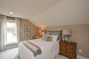 Bedroom in Banyan-II floor plan with modern decor.